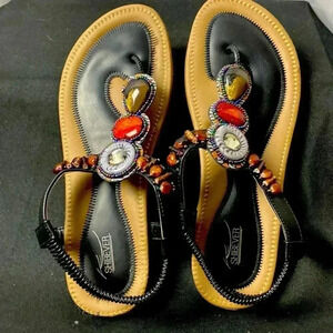 WO SIZE 10.5(EU43) BLACK AND TAN THONG SANDALS WITH LARGE BEAD ACCENT